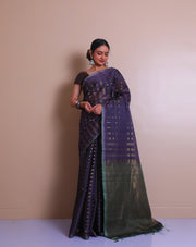 The dark mauve soft silk saree with zari triangles woven all over the drape sounds absolutely mesmerizing. - KSL03115