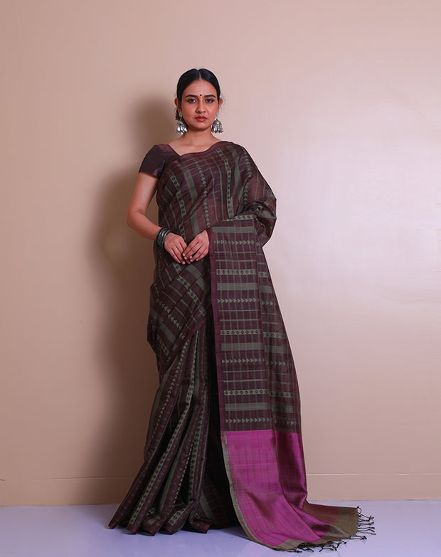 The brown soft silk saree with green thread woven in a geometrical design all over the drape - KSL03125