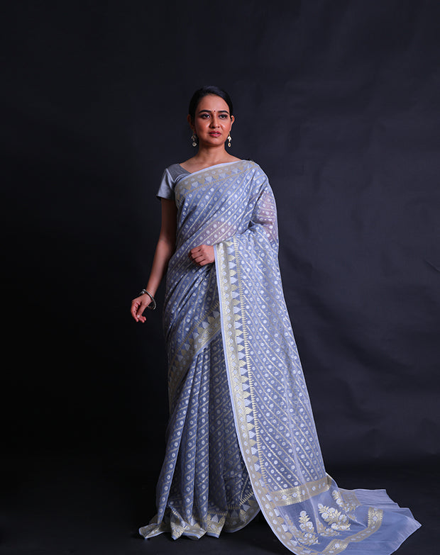 The light blue kora cotton saree with zari and thread woven buttis all over the drape,- BSK010529