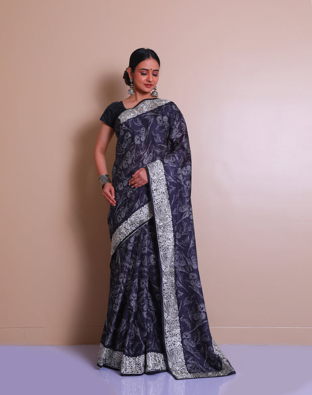 The black blended Tussar saree with Parsi embroidery on the border and pallu sounds absolutely exquisite - BLN01414