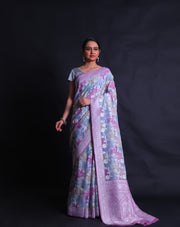 The pink semi Khadi georgette saree with rangkhat design and silver zari woven all over the drape,- CHG04011