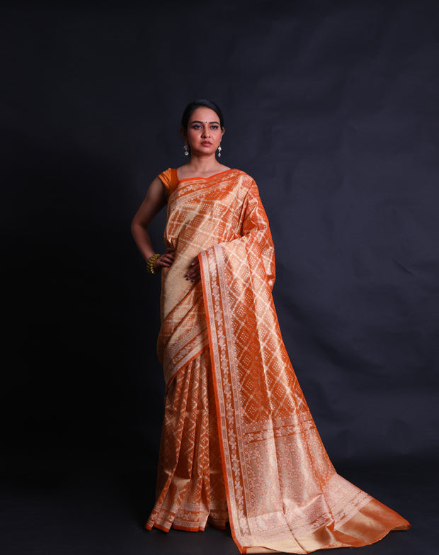 The orange Banarasi tissue saree with thread woven all over the drape,- BSK010772