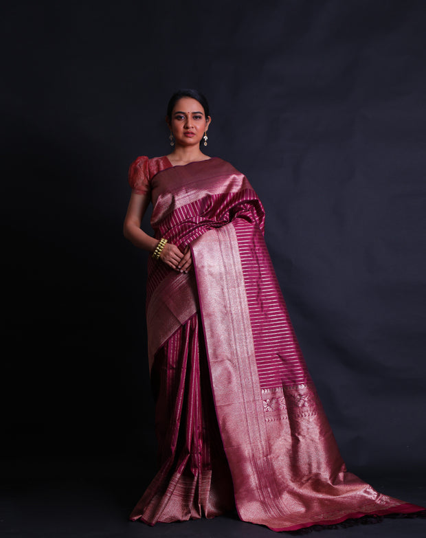 The wine Kanjivaram silk saree with vertically woven zari lines all over the drape,- KSL03140