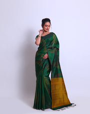 A Bottle Green South Soft Silk saree with a combination of red and yellow lines woven as a design on the border and all over the drape sounds captivating - KSL03091