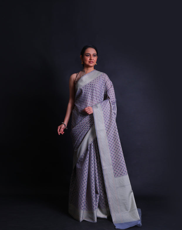The grey Banarasi cotton saree you're describing sounds sophisticated and visually appealing.- FCT011110
