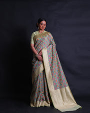 The green Banarasi cotton saree with Meenakari design all over the drape sounds absolutely stunning.- BSK010538