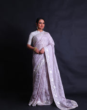 The lilac silk Kota saree with thread embroidery all over the drape sounds lovely and delicate.- EMB03357