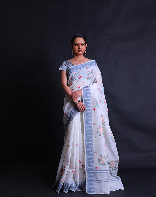 The white fancy supernet cotton saree adorned with colorful flower designs in machine embroidery sounds enchanting,- FCT011112
