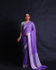 The mauve Khadi georgette saree with raindrop design and lines woven in silver zari all over the drape,- CHG04064