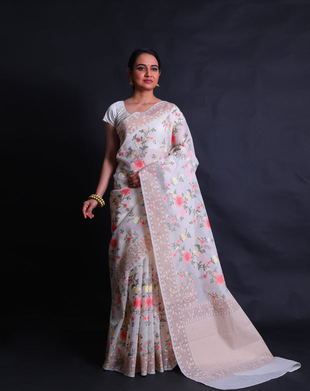 The off-white fancy cotton saree with shades of beige woven in thread as the border and pallu,- FCT011150