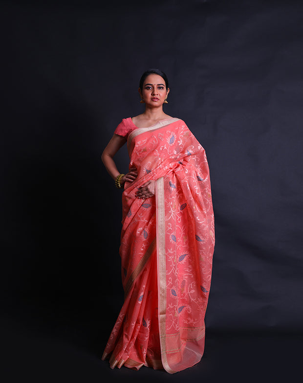 The peach fancy cotton saree with machine thread embroidery all over the drape sounds elegant and chic.- FCT011112