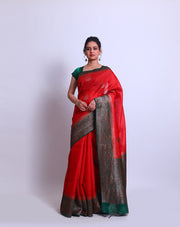 A Red Handloom Tussar saree with a green contrast and antique Zari woven on the border and pallu sounds stunning - BSK010681