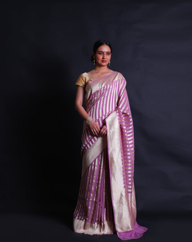 The pink Khadi georgette Banarasi saree you described sounds elegant and refined.- CHG04041