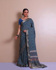 The blue blended saree with Ajrakh print all over the drape sounds absolutely stunning! - BLN01001
