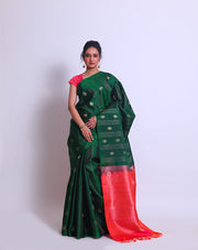 The bottle green Kanjivaram Soft South Silk saree sounds absolutely exquisite - KSL03087