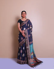 The dark blue semi-Tussar saree with batik print and mirror work all over the drape - BLN01343