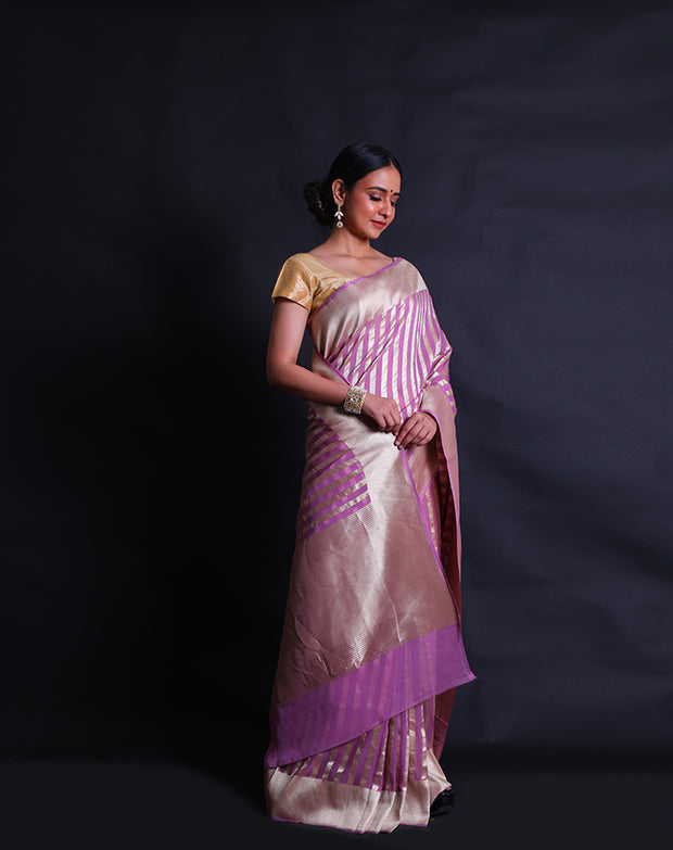 The pink Khadi georgette Banarasi saree you described sounds elegant and refined.- CHG04041