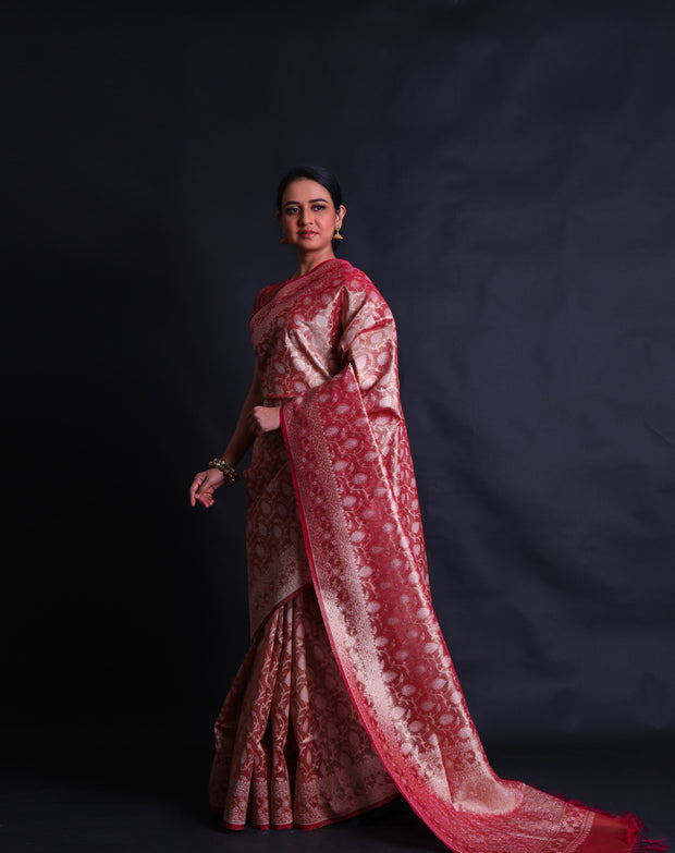 The pink Banarasi tissue saree you're describing sounds absolutely stunning.- BSK010772