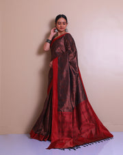 The brown South silk saree with tanchui design woven all over the drape sounds rich and luxurious. - KSL03146