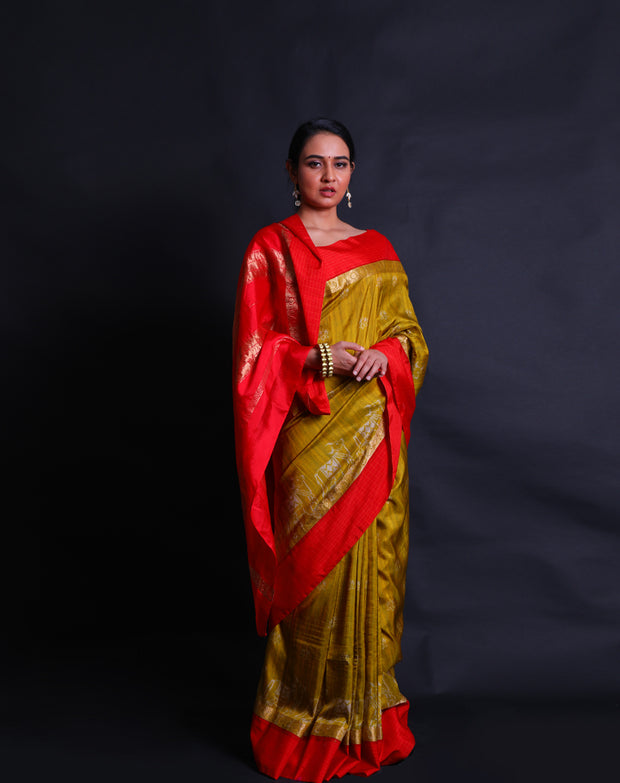 The green pure silk saree, adorned with an all-over print, exudes timeless elegance and grace. Its border and pallu,- PTS05302