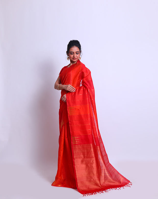 A Kesari Soft South Silk saree with self red lines and Zari lines woven all over - KSL03116