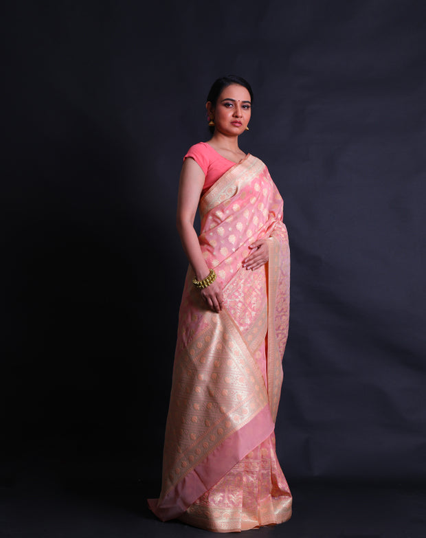 The peach Banarasi summer crepe saree with thread and gold zari woven buttis.- BSK010447