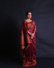 The wine blended silk saree with colorful Baluchi design woven all over the drape,- BLN00756