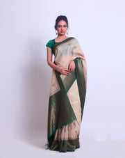 An Off-White Tussar Handloom Saree with antique Zari on the border and pallu - BSK010684