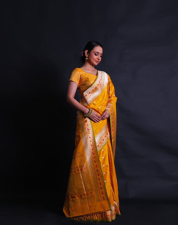 The mustard Banarasi silk saree you're describing sounds exquisite and vibrant.- BSK09081