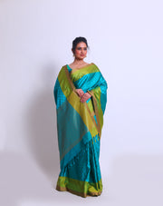 The Blue South Silk saree with small buttis woven on self-color all over the body sounds elegant and understated - KSL03058