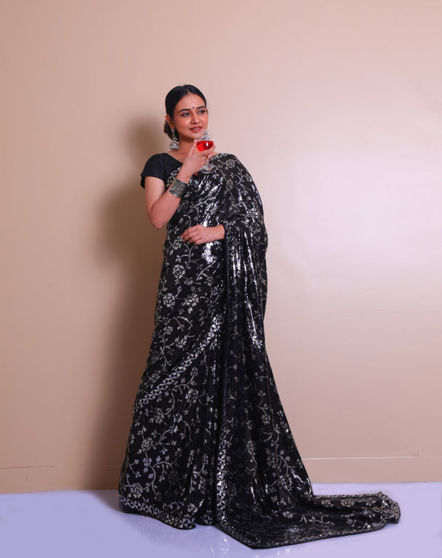 The black blended georgette saree with silver and black sequence embroidery sounds absolutely glamorous - BLN01320