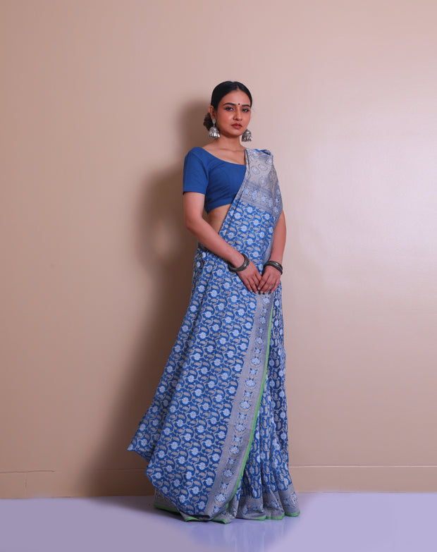 The blue cotton Handloom saree you described sounds charming and elegant. - BSK010565