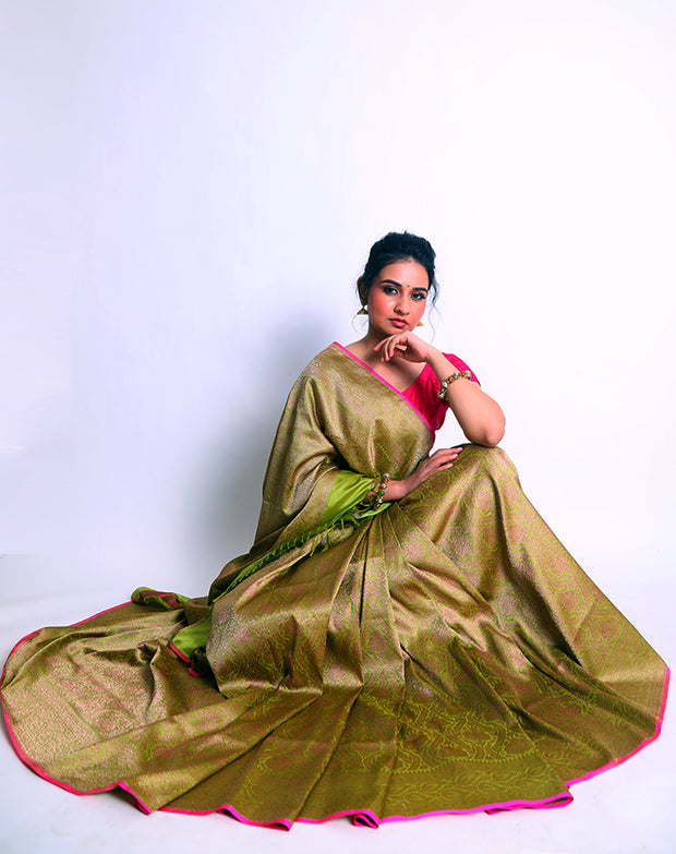 The Green Banarsi Handloom saree with antique zari detailing in the border - BSK010296