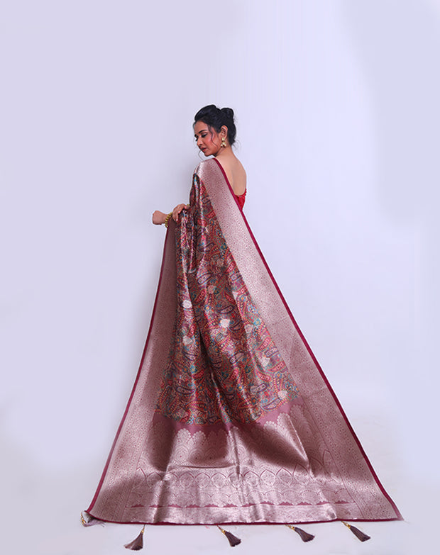 The brown blended saree with a parsley design all over the drape, accented by silver zari buttis and a rust selvage - BLN01139