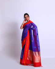 A Royal Blue Silk Kota Checks saree with a contrast red and kearai border sounds elegant and traditional - KSL02926