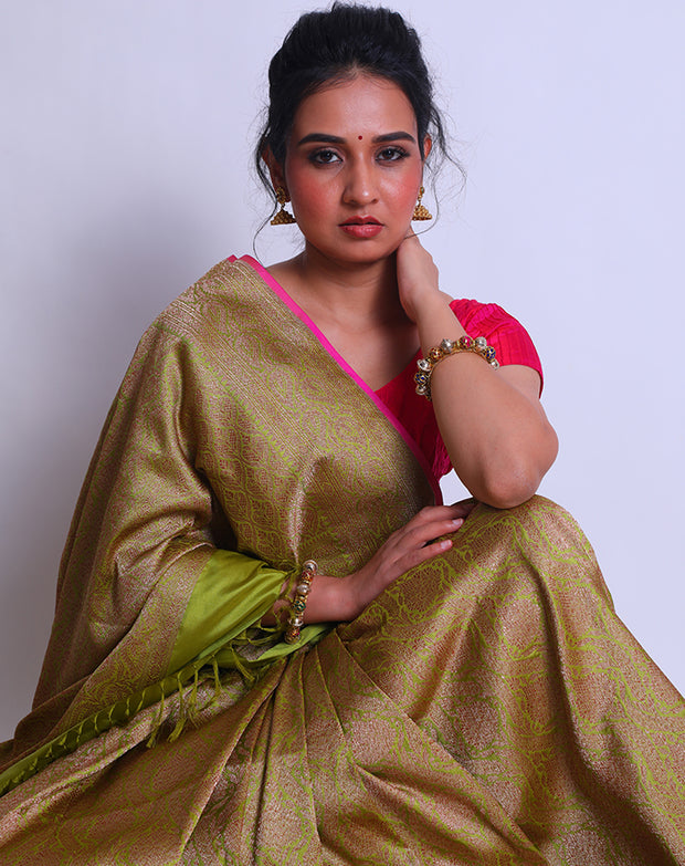 The Green Banarsi Handloom saree with antique zari detailing in the border - BSK010296