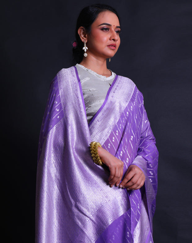 The mauve Khadi georgette saree with raindrop design and lines woven in silver zari all over the drape,- CHG04064