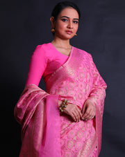 A pink cotton saree with self-woven designs and zari added throughout the drape,- FCT011114