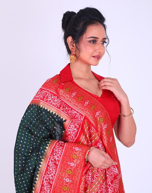 A Blended Silk Bottle Green Saree with Orissa design and small buttis all over sounds absolutely lovely - BLN01236