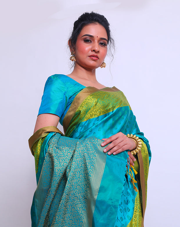 The Blue South Silk saree with small buttis woven on self-color all over the body sounds elegant and understated - KSL03058