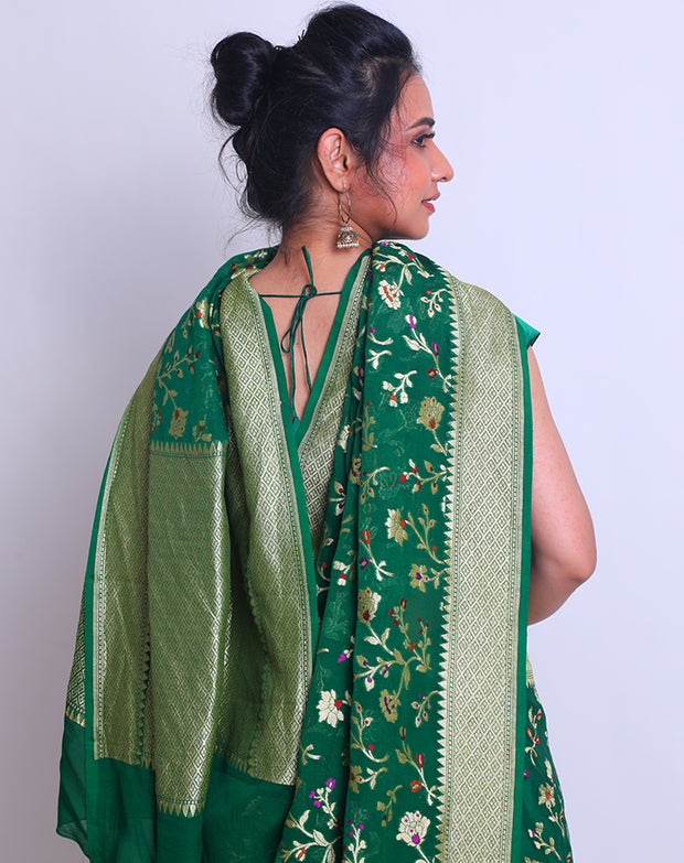 A Bottle Green Khadi Georgette saree with a zari border and pallu - CHG04059