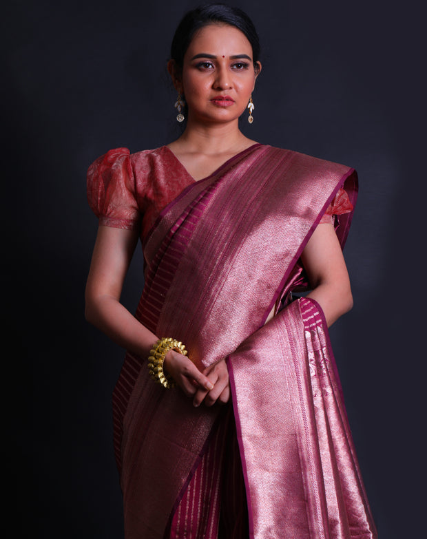 The wine Kanjivaram silk saree with vertically woven zari lines all over the drape,- KSL03140