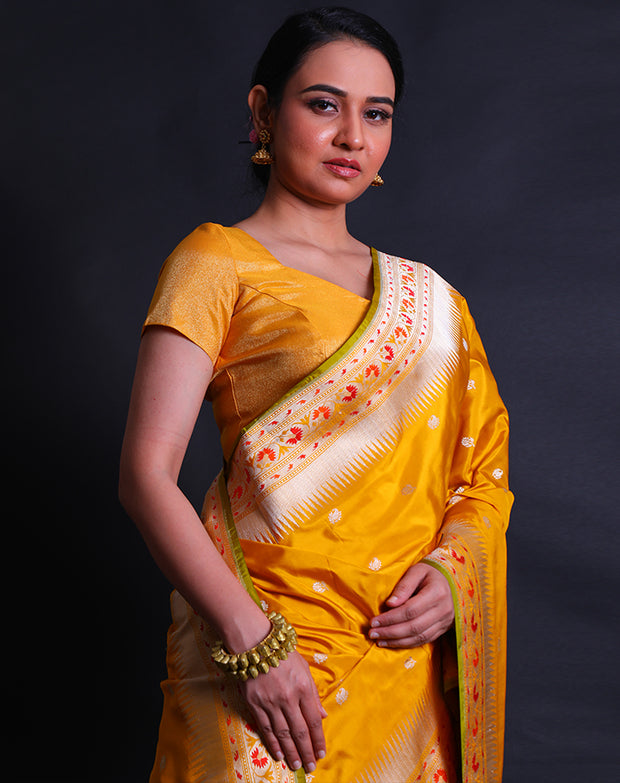 The mustard Banarasi silk saree you're describing sounds exquisite and vibrant.- BSK09081