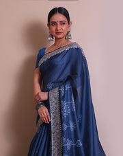The indigo blended saree with print all over the drape and cutwork embroidery on the border and pallu. - BLN01432