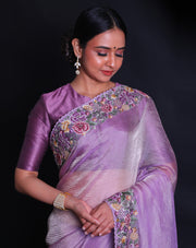 The mauve tissue saree you've described sounds absolutely lovely, especially with the petit point embroidery adding delicate details.- EMB03359