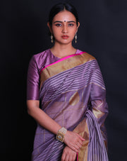 The mauve Banarasi handloom cotton saree you've described exudes elegance with its intricate details.- BSK010730