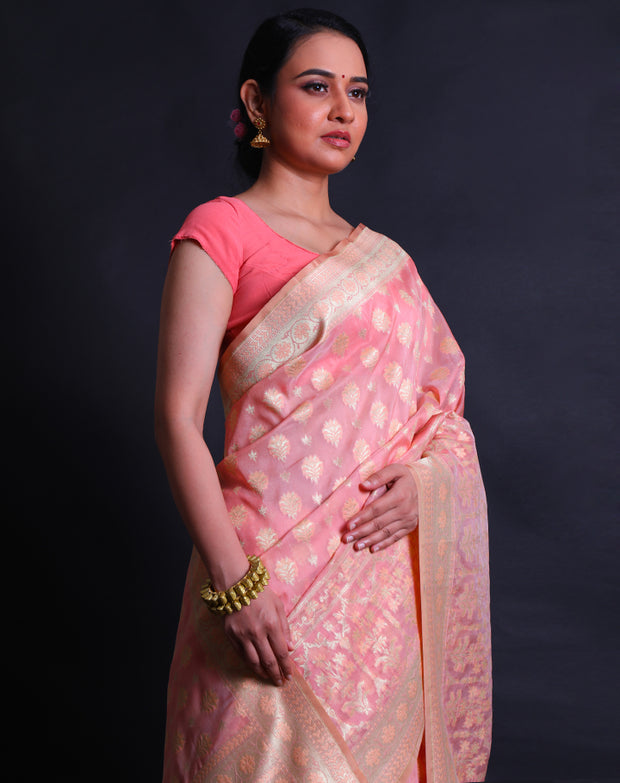 The peach Banarasi summer crepe saree with thread and gold zari woven buttis.- BSK010447