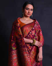 The wine blended silk saree with colorful Baluchi design woven all over the drape,- BLN00756