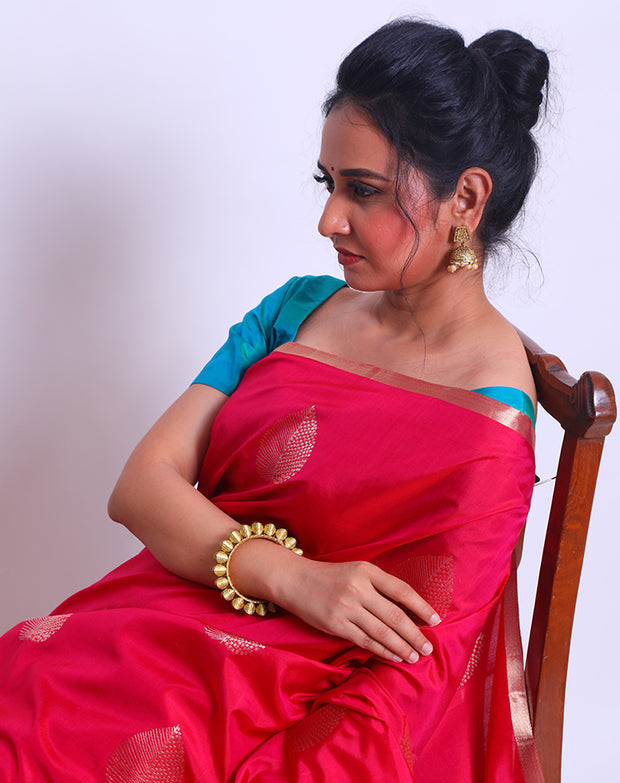 The Pink South Silk saree with thin zari border and zari big leaf buttis all over the drape sounds absolutely charming - KSL03104