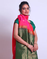 A Gold Spot Kanjivaram Soft Silk saree with gold and silver buttis all over the drape sounds opulent - KSL03083